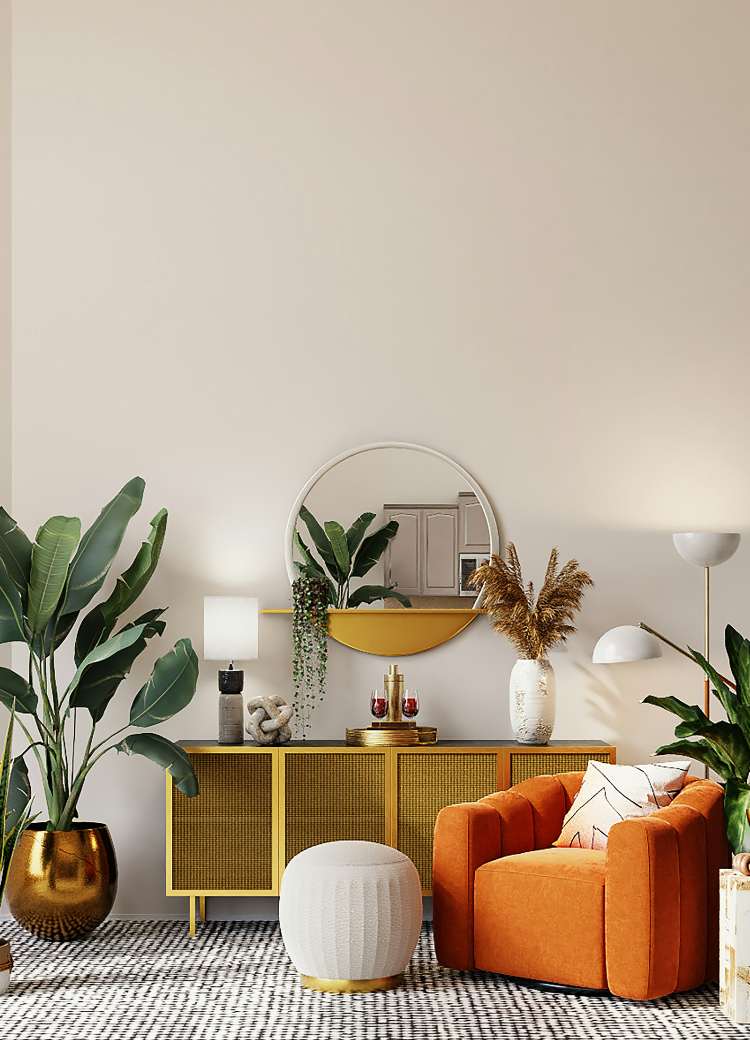 Retro inspired living room with patterned carpet plants and gold accent furniture