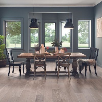 hardwood floors in a moody dining room